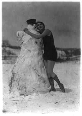 Woman in bathing suit hugging a snowman - 1924 (from Library of Congress)